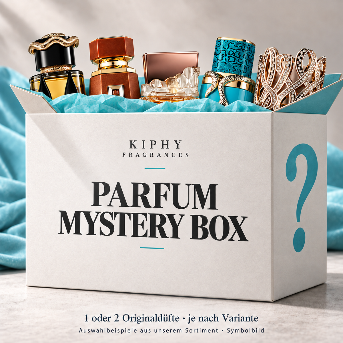 Kiphy Parfum Mystery Box mit höherer Box und teilweise verdeckten Flakons von Teriaq Intense, Liquid Brun, Ateeq, Vulcan Feu und Dalal – Auswahlbeispiele aus dem Sortiment; ein oder zwei Originaldüfte je nach Variante